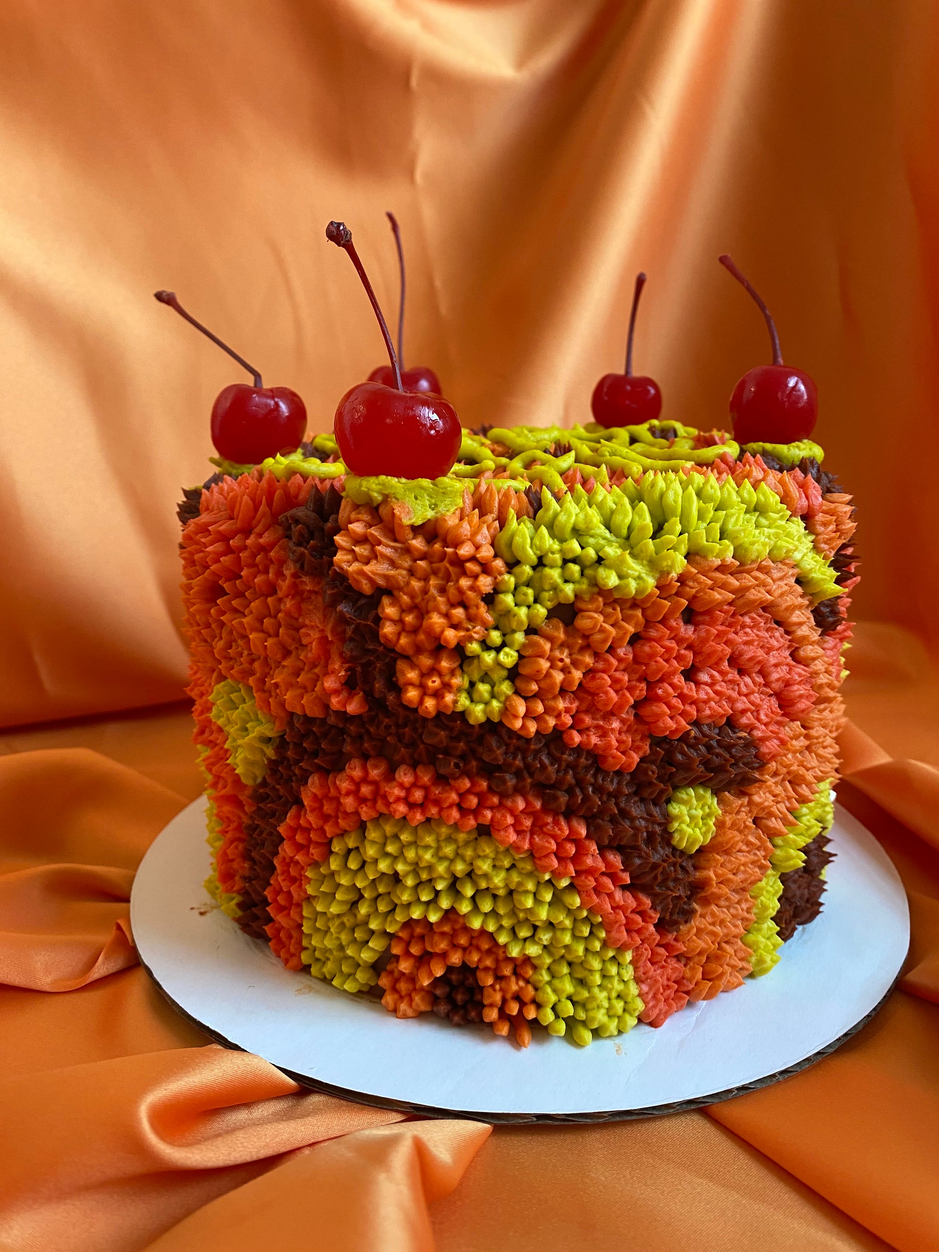 photo of a round cake with shag carpet texture in a 1970s print